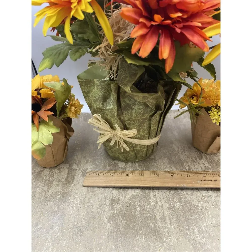 Whimsical Fall Scarecrow Floral Display in Pot Along With 2 Small Floral Pots